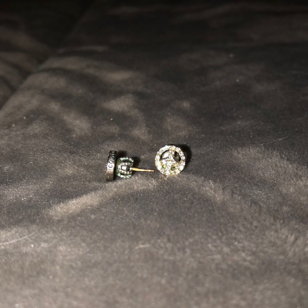 Juicy couture peace sign earrings